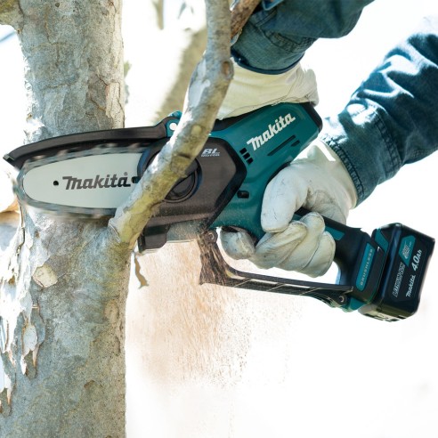 Makita UC100DWA1J Potatore a catena 10 cm Brushless CXT 12 V con batteria e caricabatterie